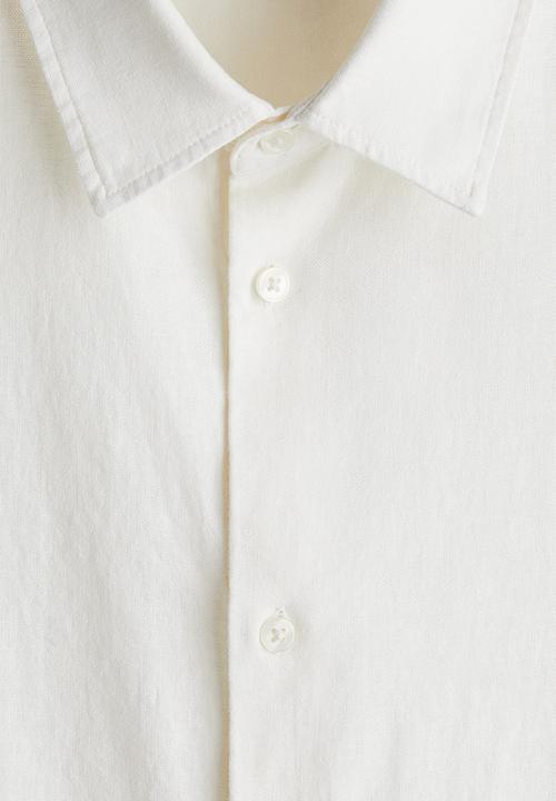 H&M - Loose fit short-sleeved linen-blend shirt - cream