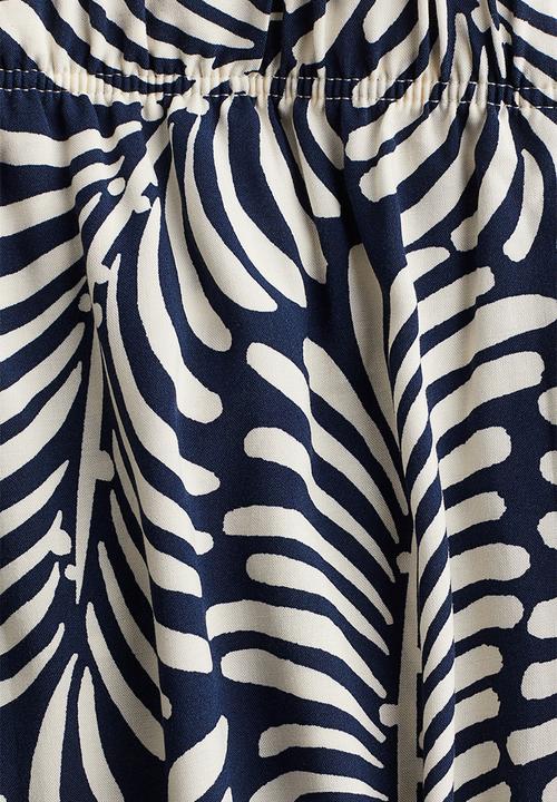 H&M - Cropped pull-on trousers - navy blue & white patterned 