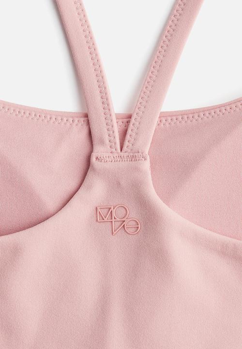 H&M - Medium support yoga bra with softmove™ - pink