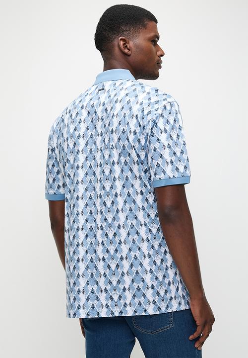 POLO - Dylan  dm printed argyle golfer - blue