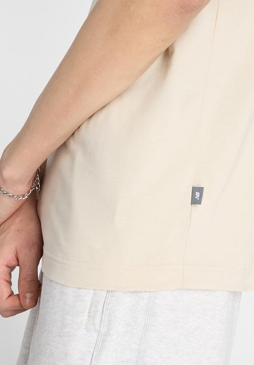 New Balance  - New Balance Newbie Fan Tee - Brown