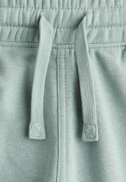 H&M - Sweatshirt shorts - light green 