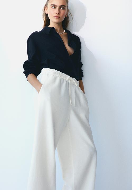 H&M - Cropped linen-blend trousers - white