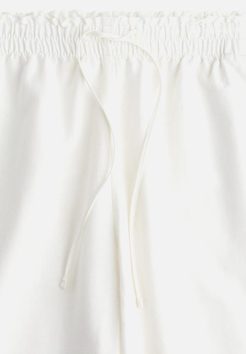 H&M - Cropped linen-blend trousers - white