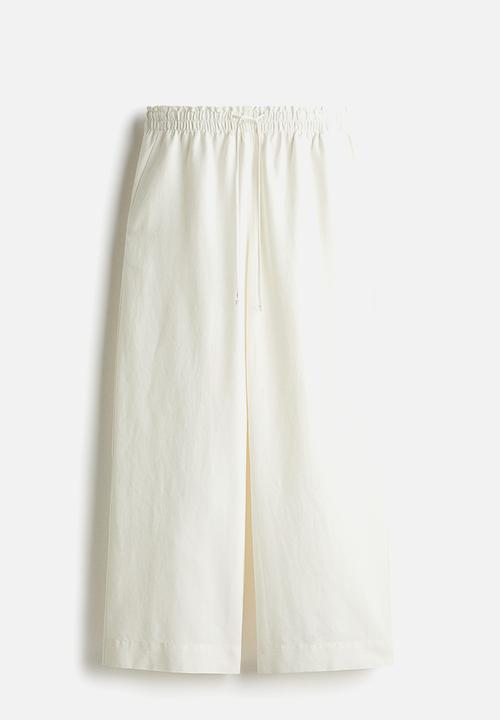 H&M - Cropped linen-blend trousers - white
