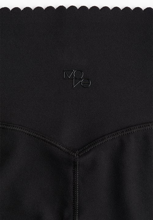 H&M - Flared sports leggings with softmove™ - black