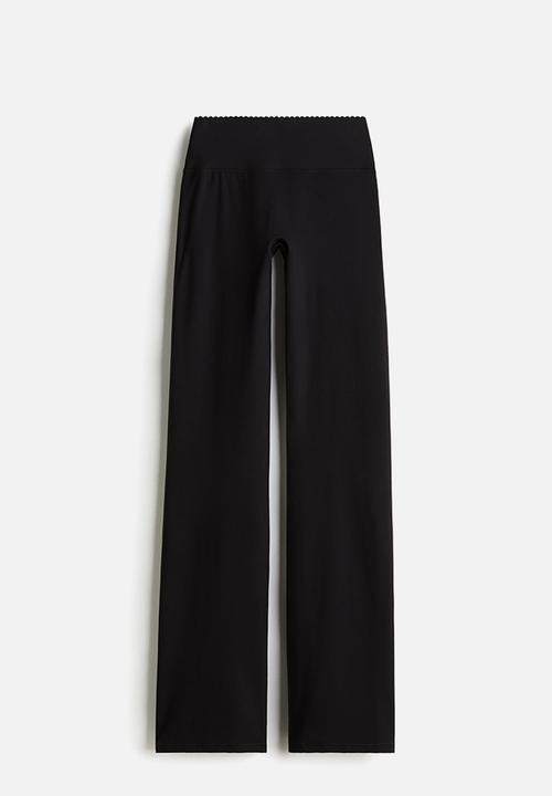 H&M - Flared sports leggings with softmove™ - black