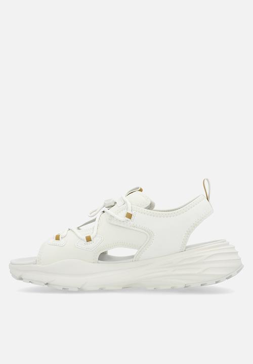PUMA - Hypnotic Sandal DayINight - Vapor Grey- Gold-Warm White