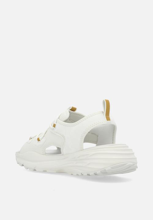 PUMA - Hypnotic Sandal DayINight - Vapor Grey- Gold-Warm White