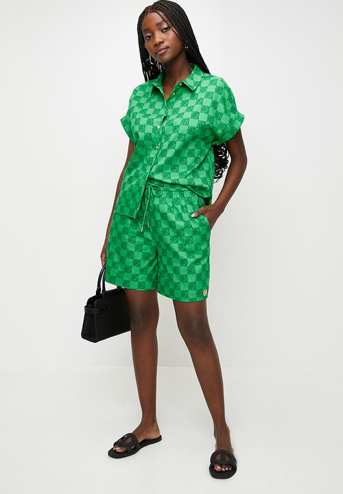 Steve Madden - Ladies Ayra Allover Printed Logo Shorts - Emerald