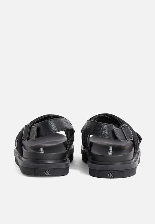 Calvin Klein - FLAT MOLDED CRXS SLING SANDAL CV - Triple Black