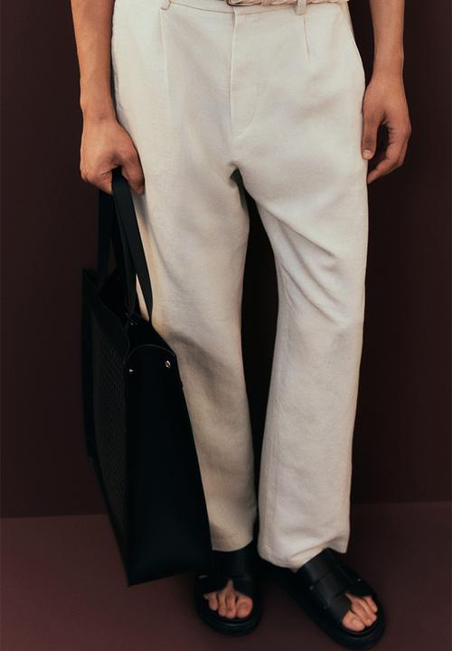 H&M - Relaxed fit linen-blend trousers - cream