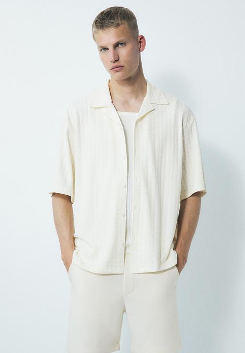 H&M - Regular fit sweatshorts - cream 