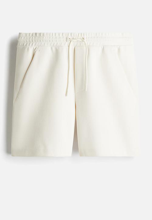 H&M - Regular fit sweatshorts - cream 