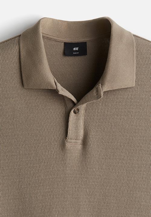 H&M - Slim fit polo shirt - dark beige 