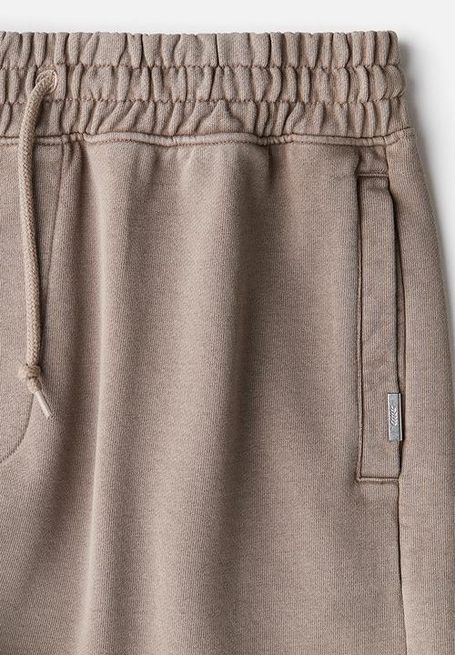 H&M - Relaxed fit cotton sweatshorts - beige
