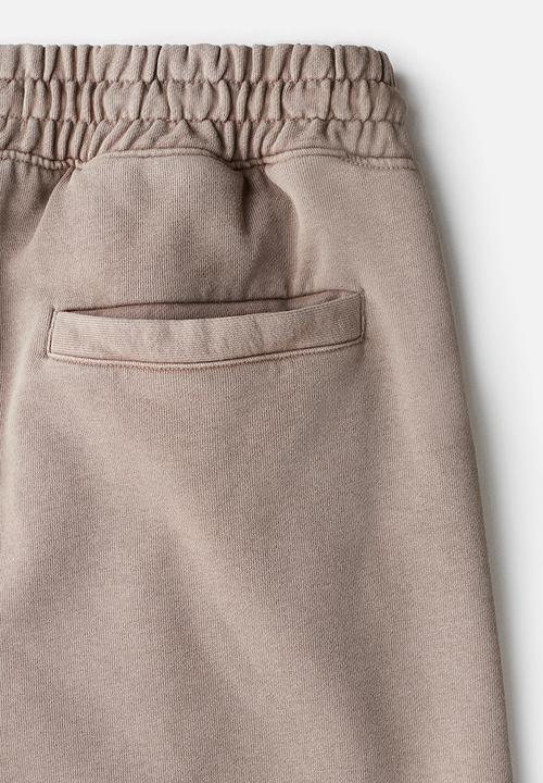 H&M - Relaxed fit cotton sweatshorts - beige