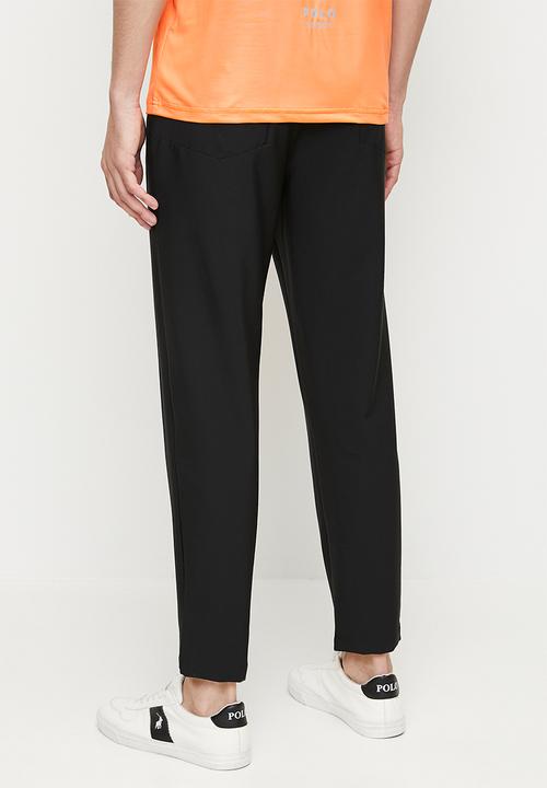 POLO - AKHONA  Sport Tech Golf Pant - Black