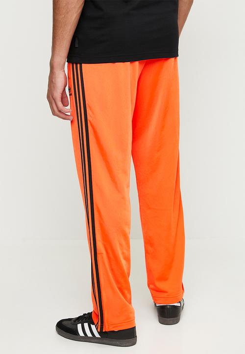 adidas Originals - Firebird Trackpant - Impact orange/black