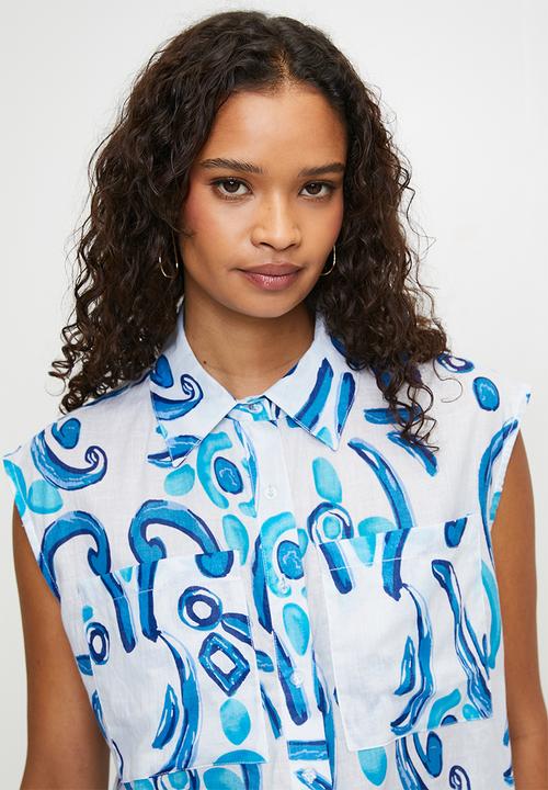 MANDI - Sleeveless Button Through Sheer Printed Blouse Longer Length - Blue