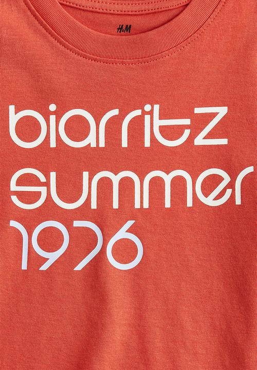 H&M - Printed T-shirt - dark orange/biarritz 