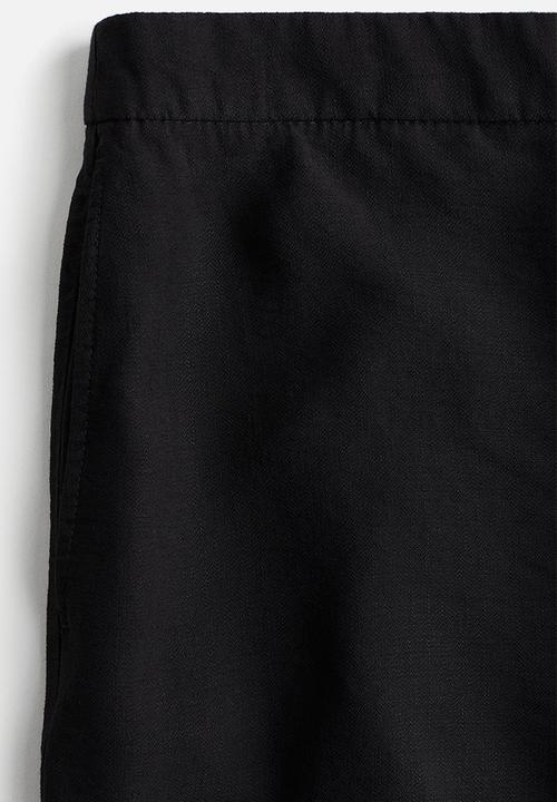 H&M - Wide trousers - black