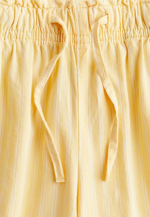 H&M - Wide cotton trousers -  yellow/striped