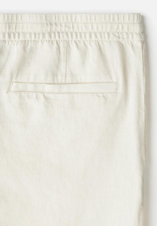 H&M - Relaxed fit linen-blend shorts - cream 