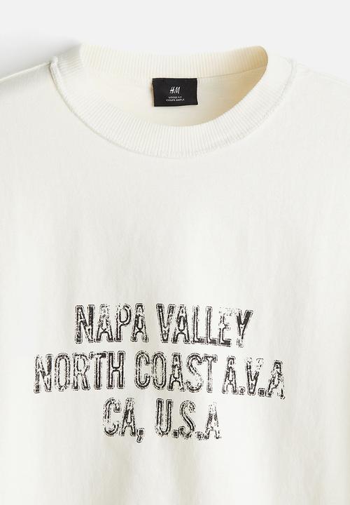H&M - Loose fit printed T-shirt - cream napa valley