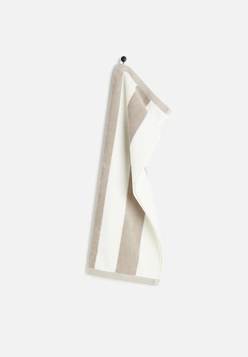 H&M - Striped hand towel - beige