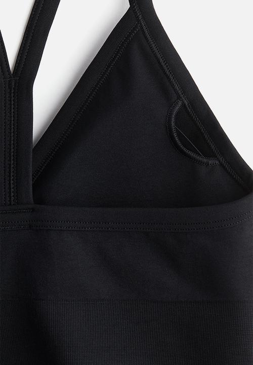 H&M - Seamless medium support sports bra with drymove™ - black