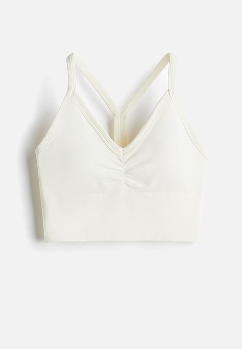 H&M - Seamless medium support sports bra with drymove™ - white