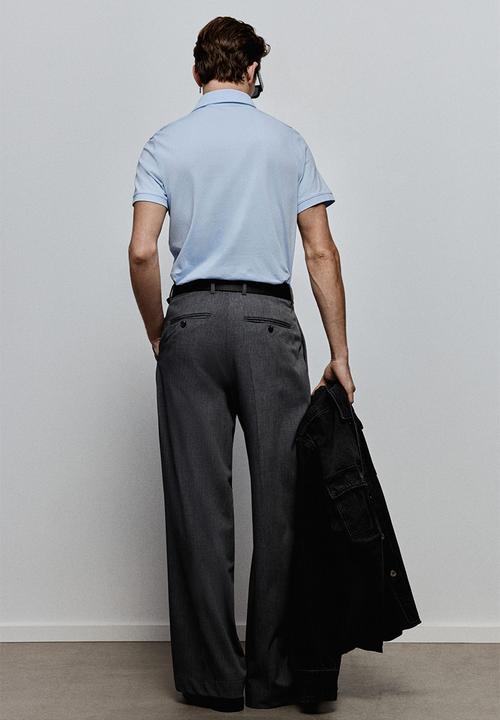 H&M - Coolmax® slim fit polo shirt - light blue