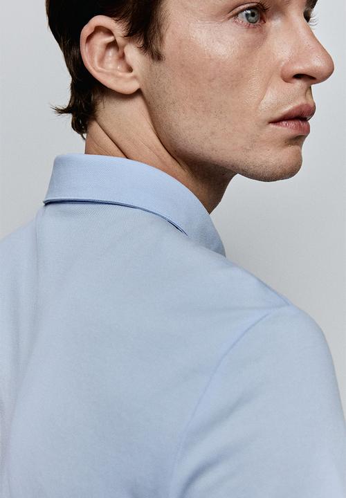 H&M - Coolmax® slim fit polo shirt - light blue