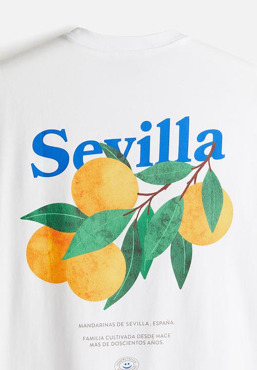 H&M - Loose fit printed T-shirt - white/sevilla