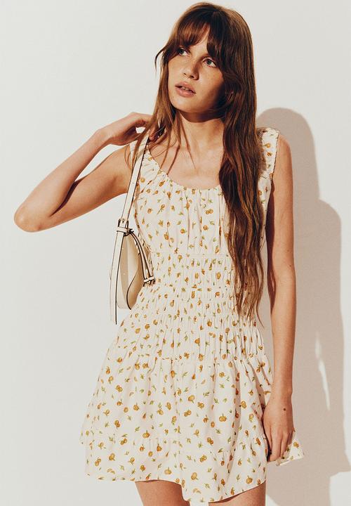 H&M - Smocked dress - cream oranges