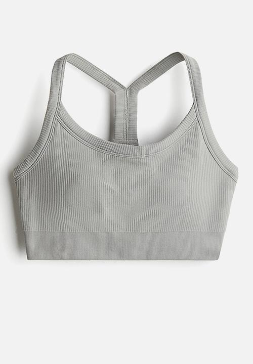 H&M - Seamless medium support sports bra with drymove™ - beige