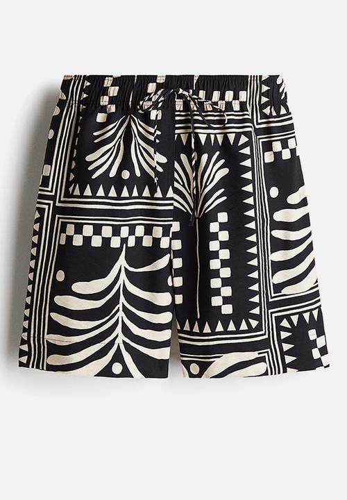 H&M - Drawstring shorts - black patterned 