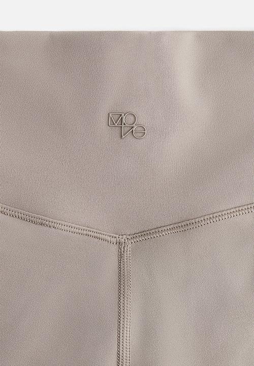 H&M - Sports cycling shorts with softmove™ - beige