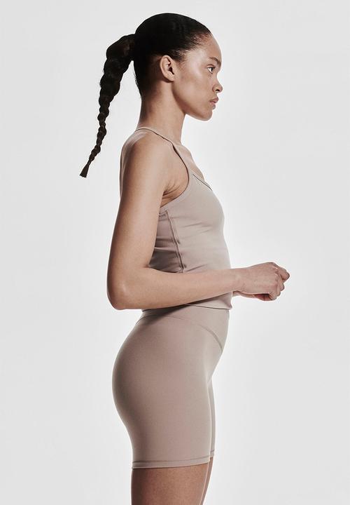 H&M - Sports cycling shorts with softmove™ - beige