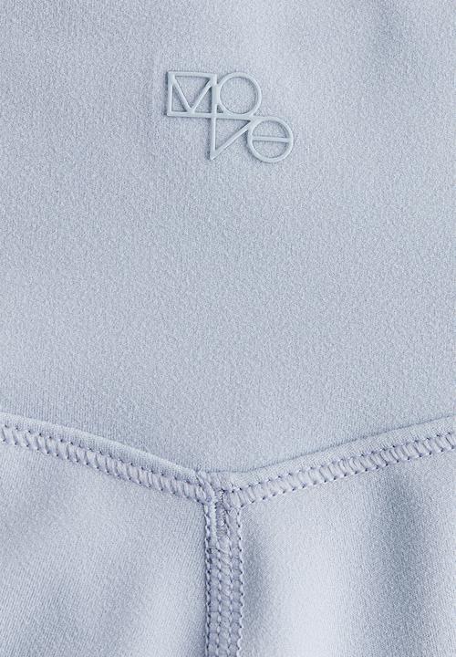 H&M - Sports cycling shorts with softmove™ - light blue