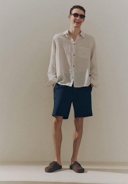 H&M - Regular fit chino shorts - navy blue