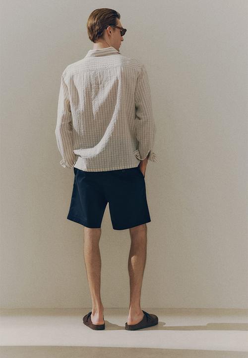 H&M - Regular fit chino shorts - navy blue