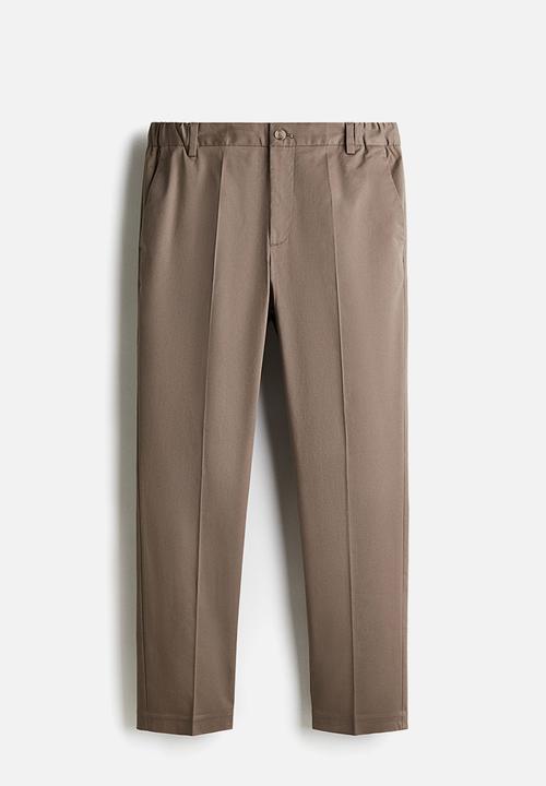 H&M - Slim fit cropped trousers - dark beige 