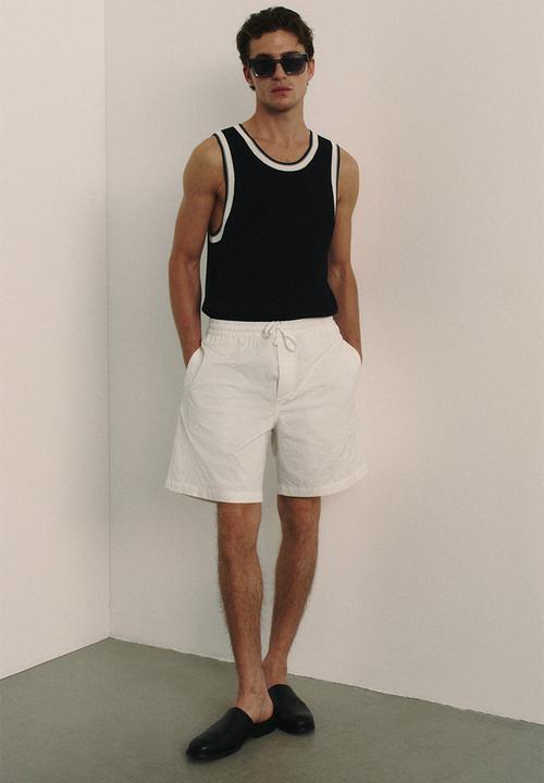 H&M - Relaxed fit embroidered shorts - cream/seashells 