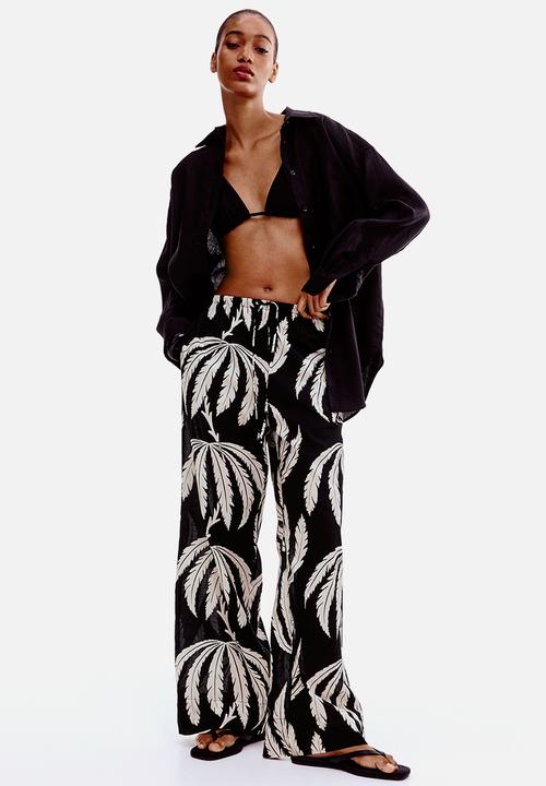 H&M - Cotton drawstring trousers - black/palm trees