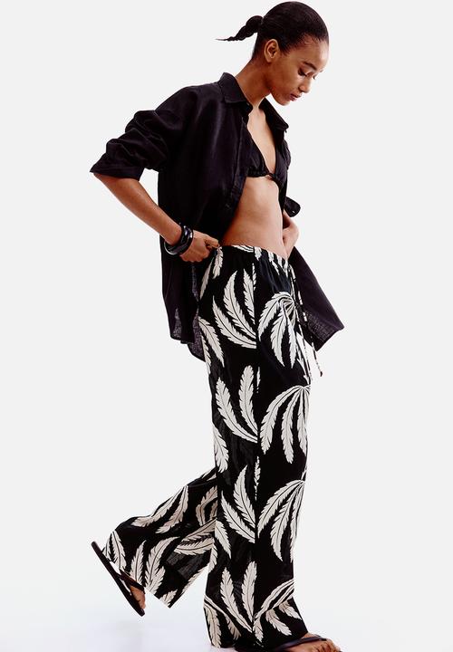 H&M - Cotton drawstring trousers - black/palm trees