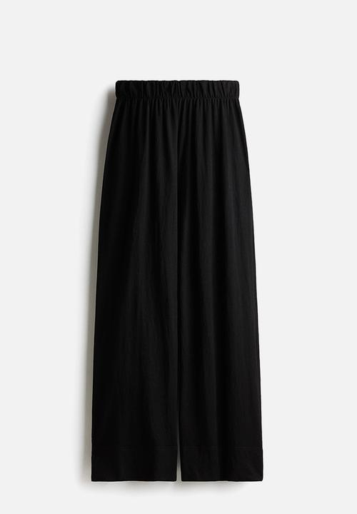 H&M - Wide trousers - black