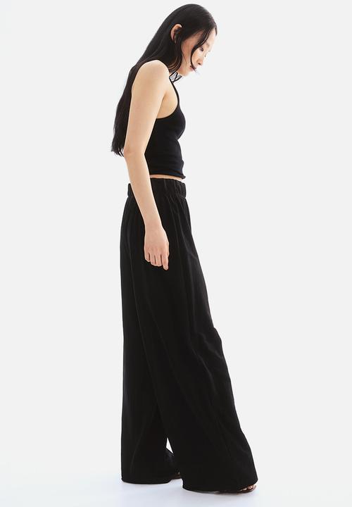 H&M - Wide trousers - black