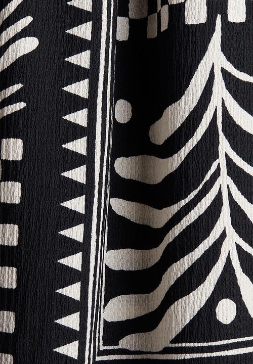 H&M - Crinkled jersey dress - black/patterned 